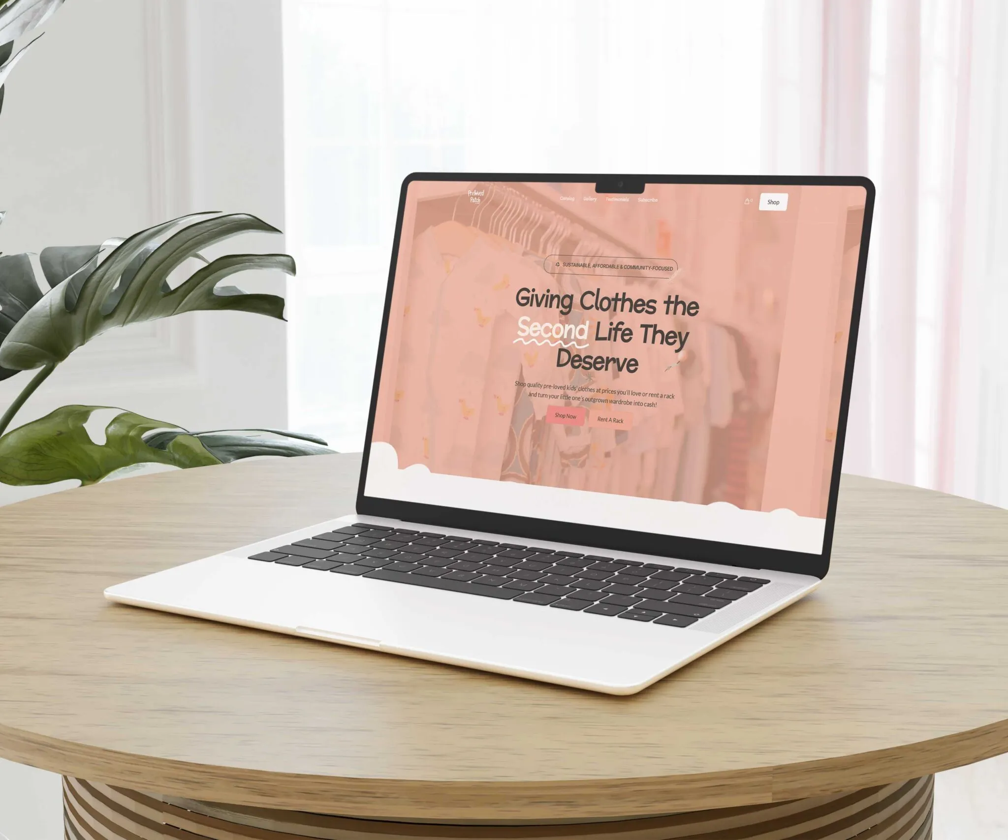A laptop showing a one-page website for a clothing resale business